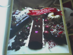 Mr. Hankey the Christmas Poo lookalike log cake